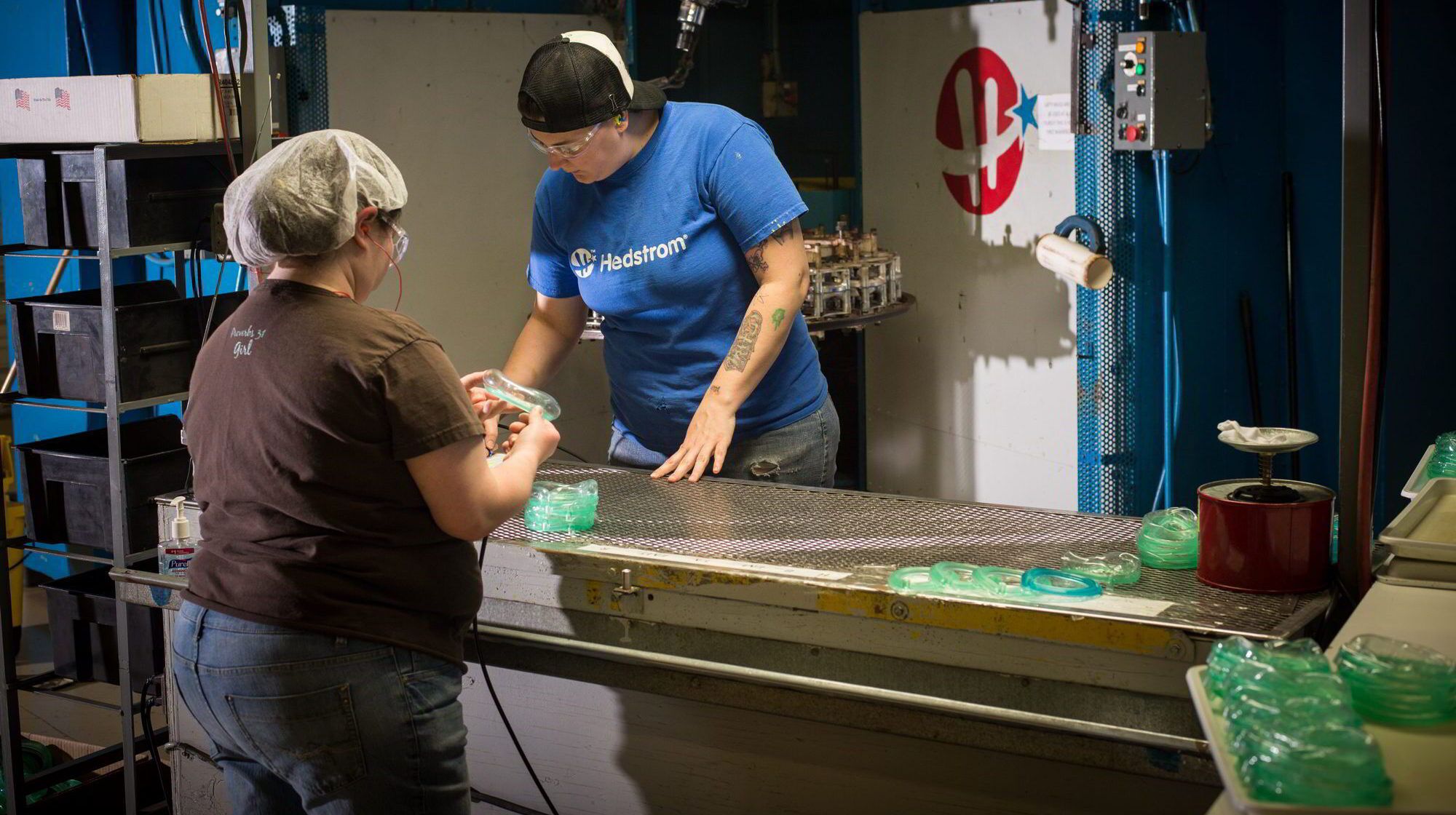 Hedstrom employees working with molds